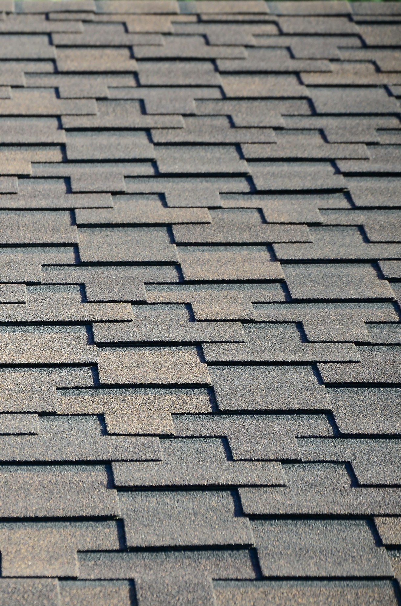 Modern roofing and decoration of chimneys. Flexible bitumen or slate shingles